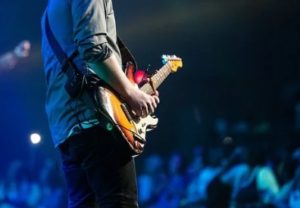 musician playing guitar